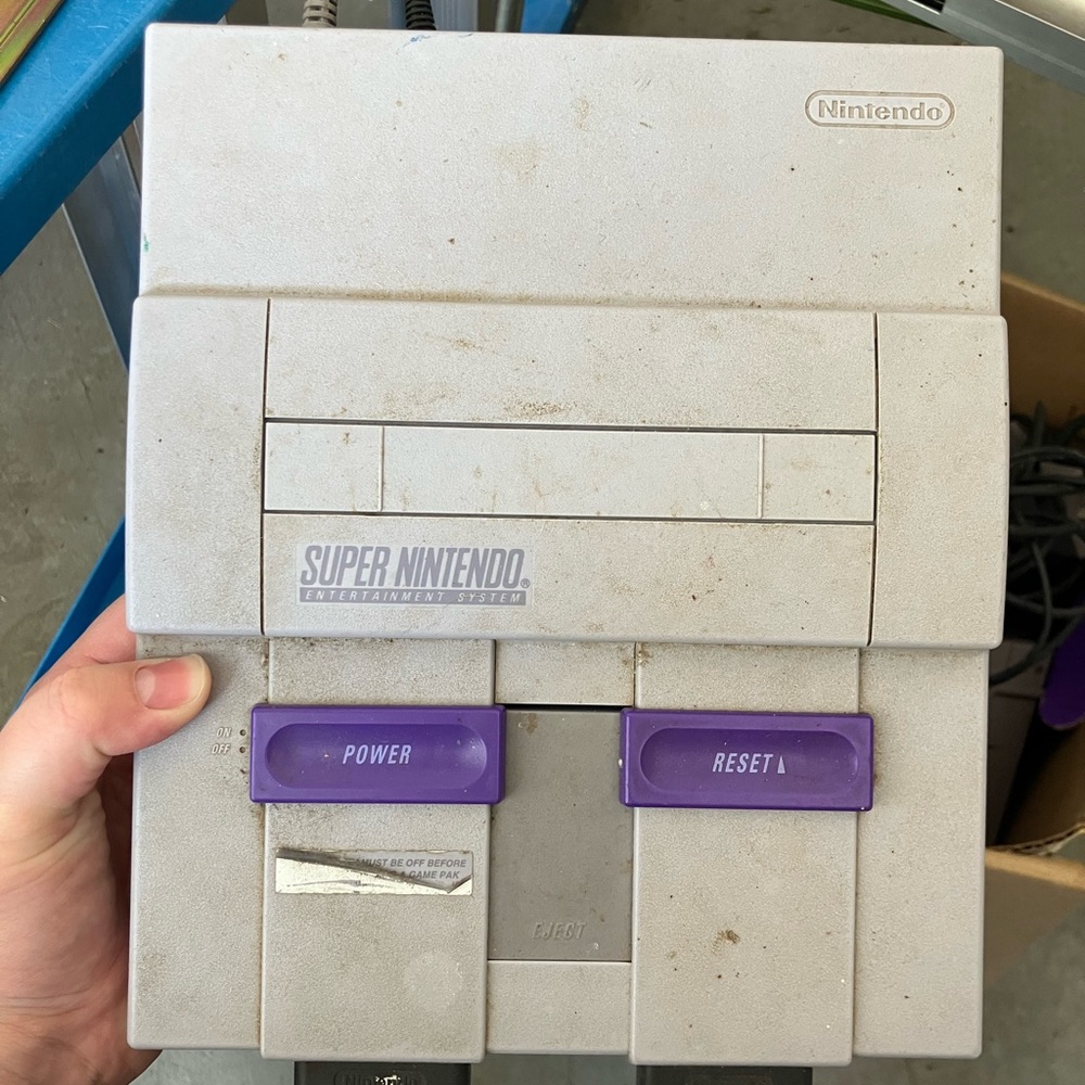 COPY - ORIGINAL Super Nintendo with all games and controllers.